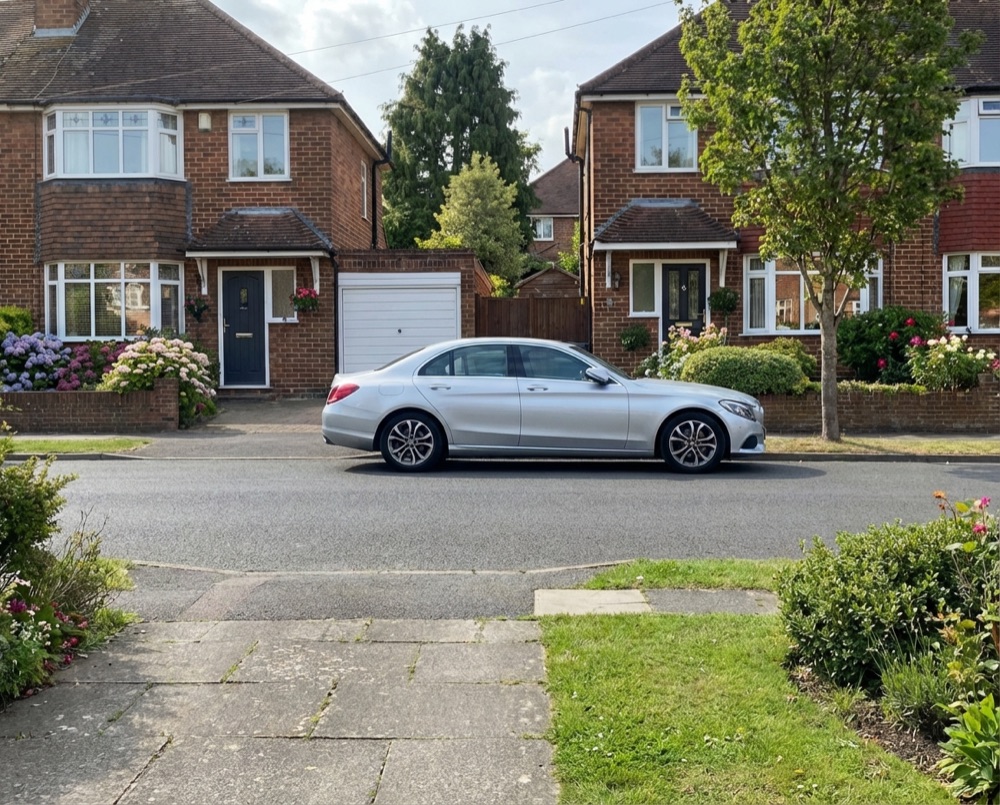 Residential street in Aldingbourne with bins ready for collection